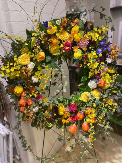 Yellow Garden Wreath Funeral Arrangement
