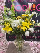 Yellow, green, and white flower arrangement  *calla lilies are sold out* Flowers included: Lilys, mini roses, hydrangeas, etc.